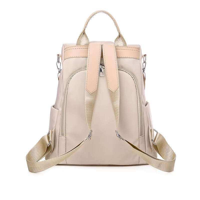 Fashionable women's anti-theft backpack with embroidery, waterproof canvas material.