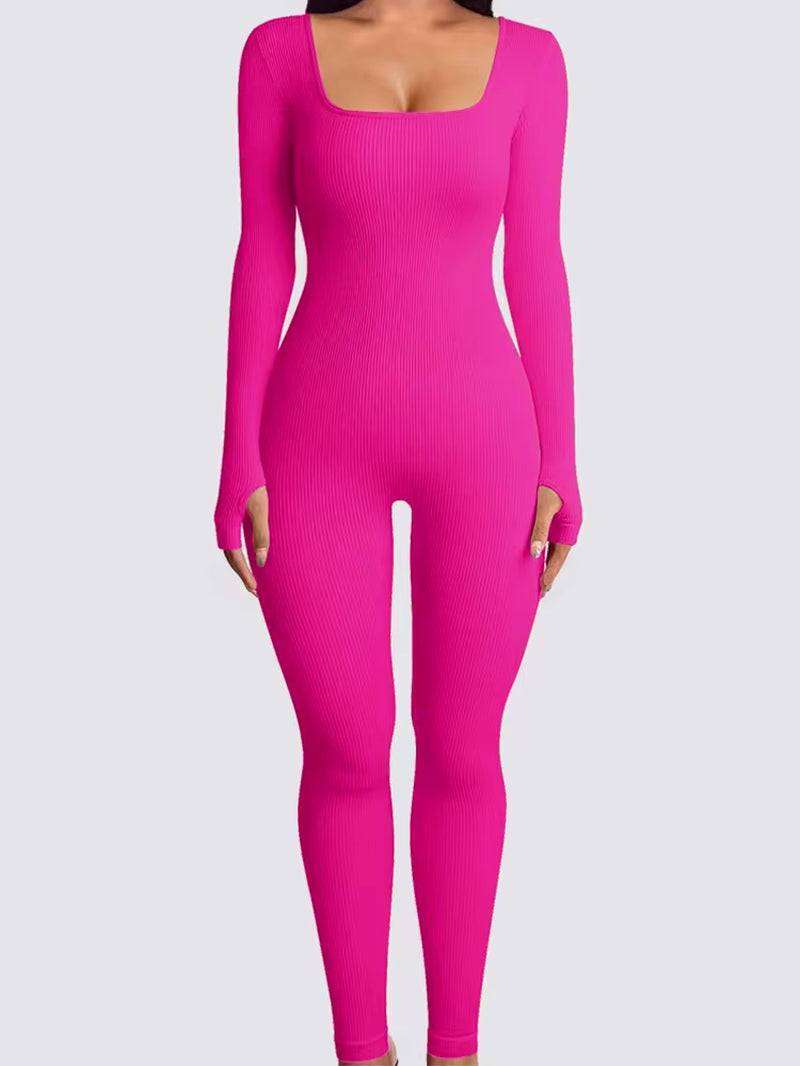 High-quality pink women's jumpsuit for yoga; long sleeves, seamless fit, shapewear design, breathable fabric, perfect for fitness.