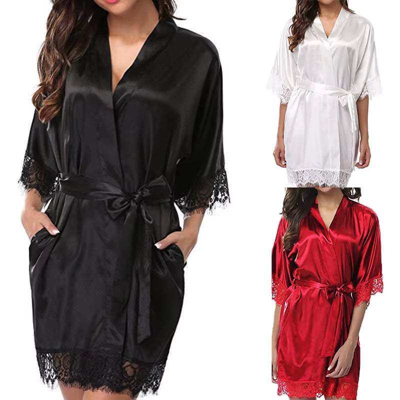 Women's silk pajamas and robes with lace detailing in black, white, and red.