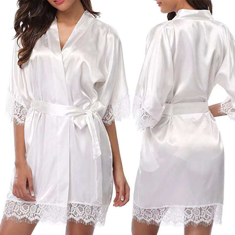 Women's white lace silk pajamas robe with elegant half sleeves, ideal for luxurious sleepwear and lounging.