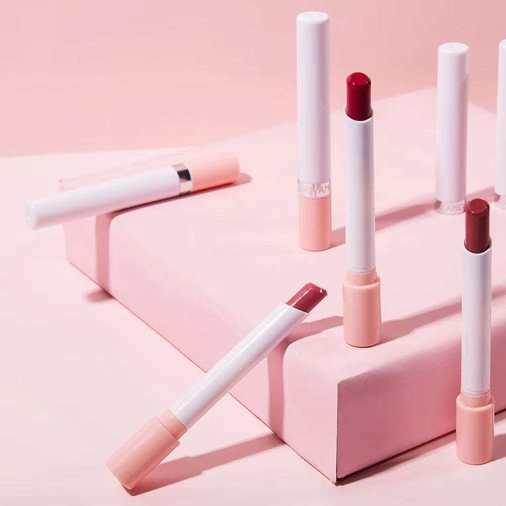 Creative Cigarette Lipstick Set with 4 Matte Waterproof Shades on Pink Background