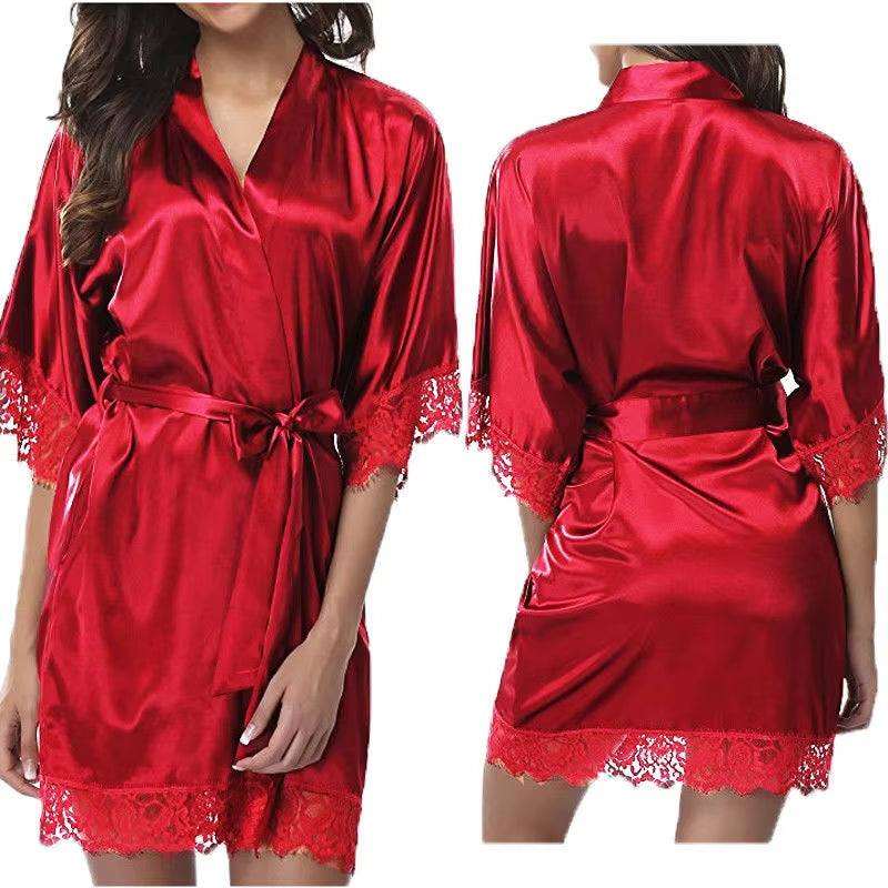 Women's red silk pajamas and robe with lace detailing, luxury sleepwear.