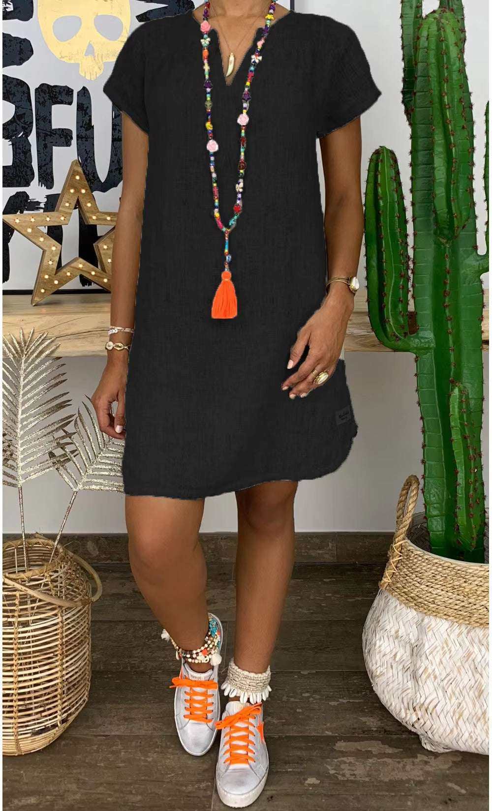 Women's black cotton-linen V-neck dress with short sleeves and casual fit, perfect for summer.