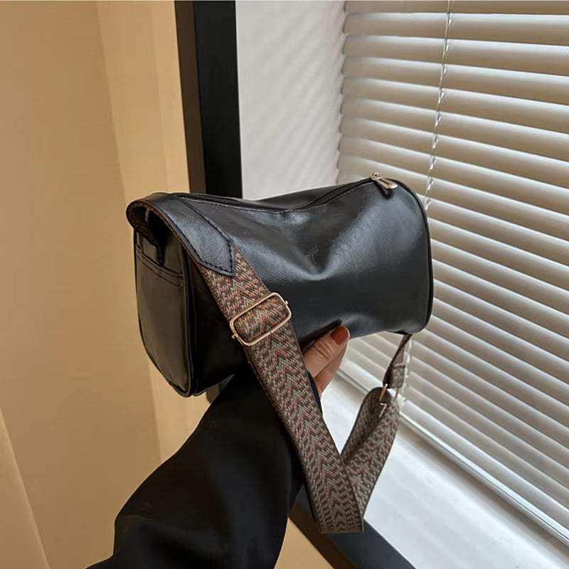 Vintage Leather Boston Women Small Crossbody Bag with adjustable strap, shown in black PU leather.