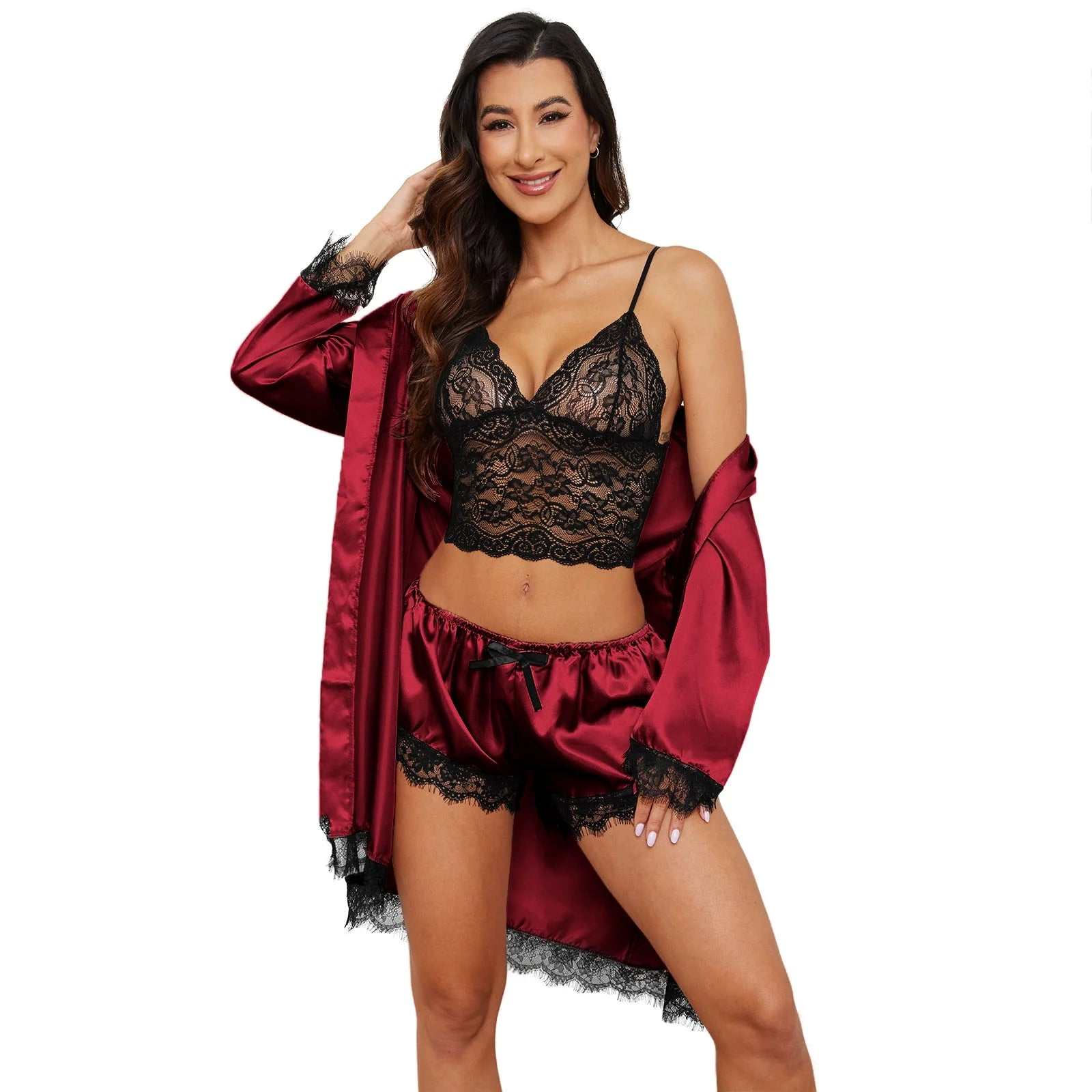 Luxurious burgundy silk satin pajamas set with lace detail, featuring a robe, top, and shorts for women.