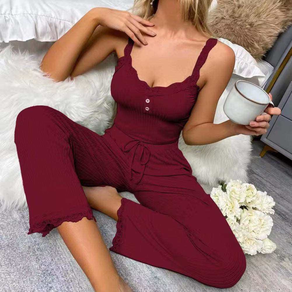 Women's summer sleep lounge set with lace patchwork halter top and long trousers in burgundy, ideal for cozy relaxation.