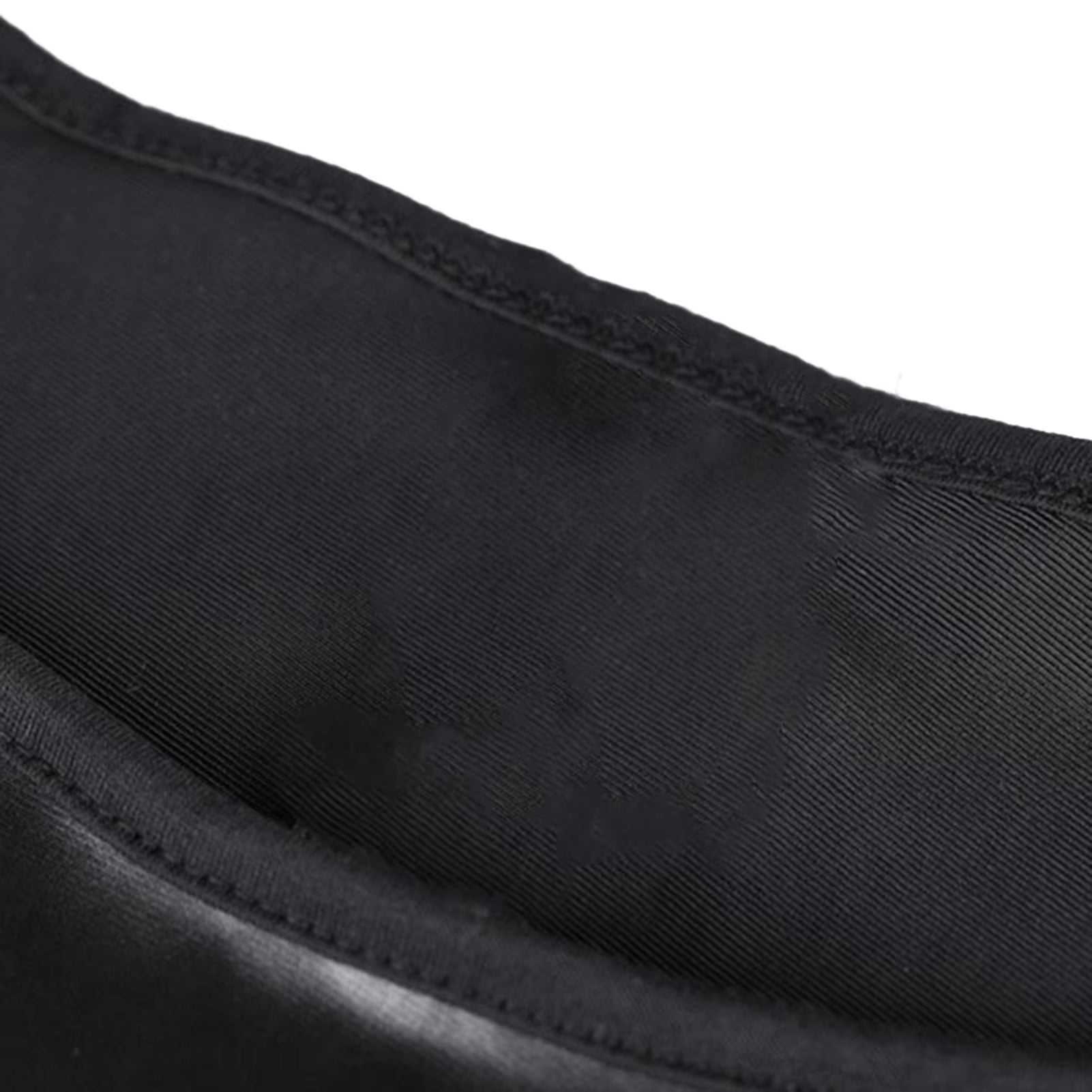 Close-up of a black faux leather women sexy dress with crew neck and sleek finish.