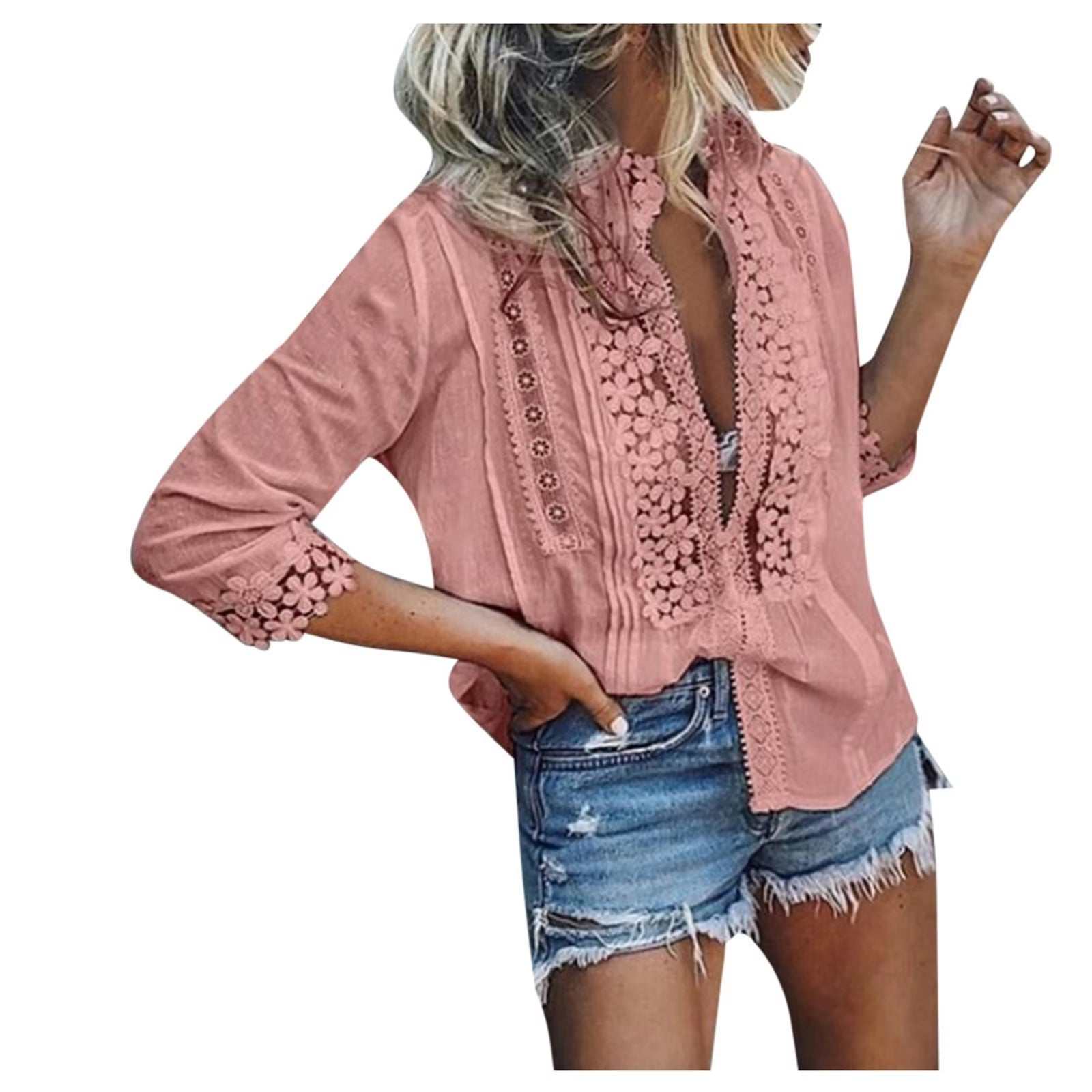 Women's casual V-neck blouse with lace detail in pink, paired with denim shorts.