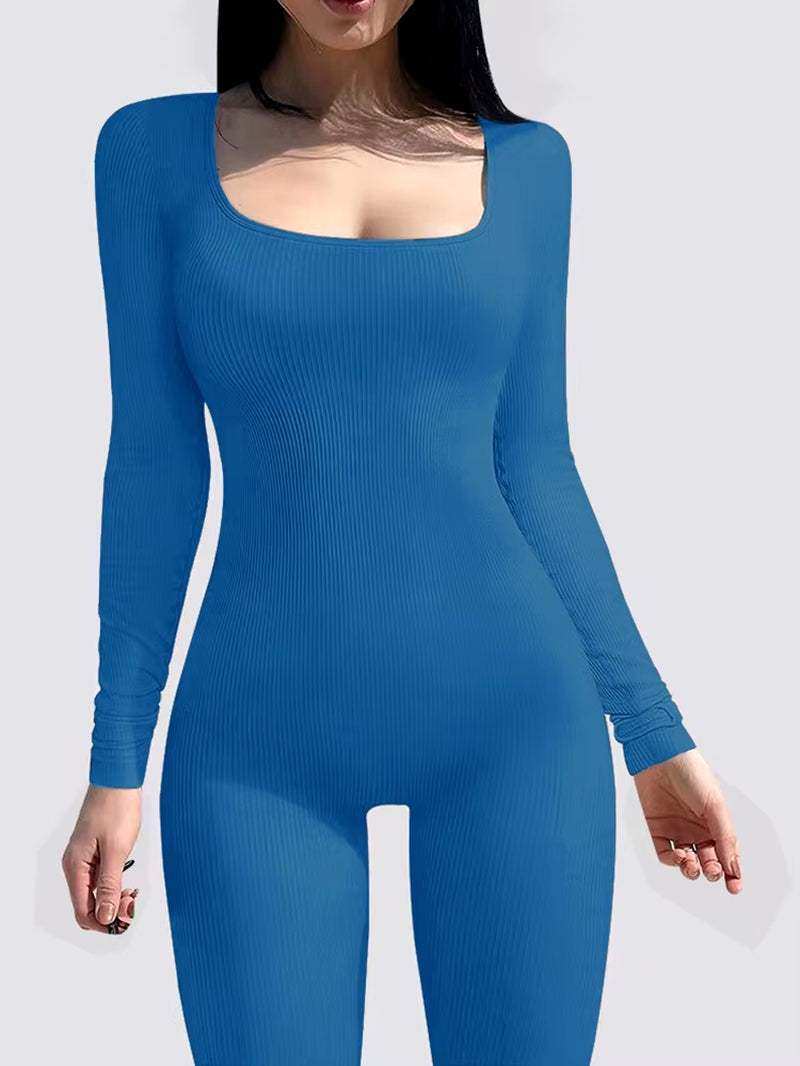 High-quality blue women's jumpsuit with long sleeves and shapewear design for fitness activities.