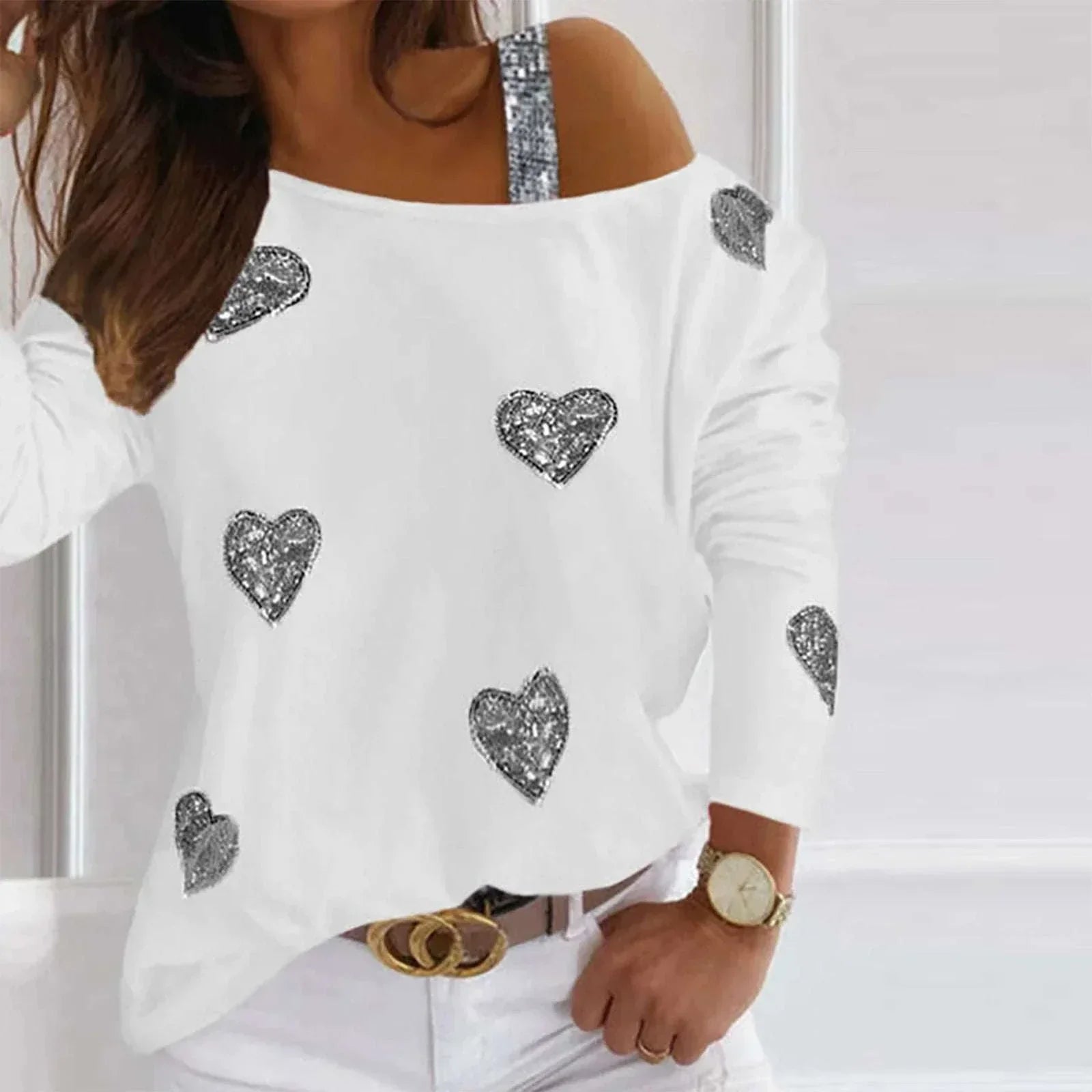 Plus size women's casual fashion top with heart print, crewneck, and long sleeves.