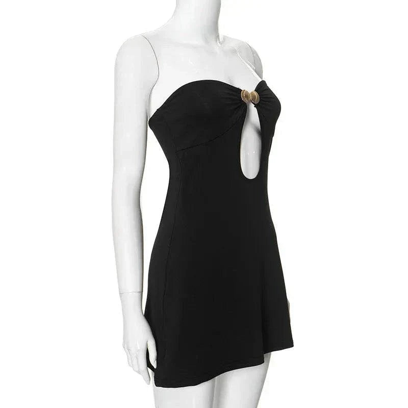 Women Beach Dress Strapless black beach dress with metal decoration and hollow out design.