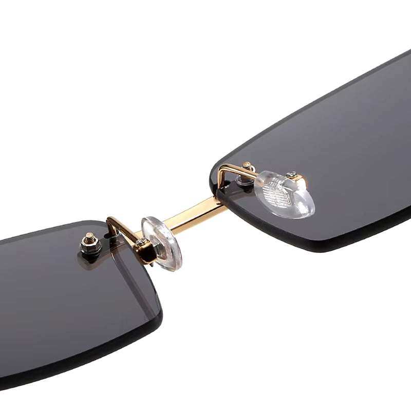 Sunglasses Rimless Rimless horn sunglasses with lightweight design and etched detailing.