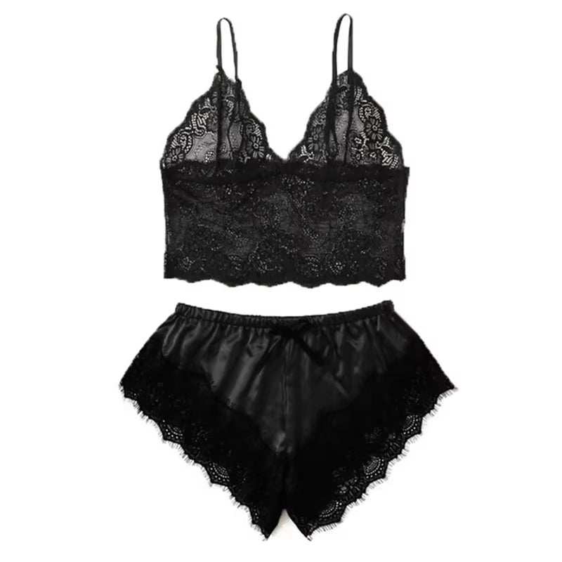 Black lace and satin 4-piece underwear set with suspender top and shorts.