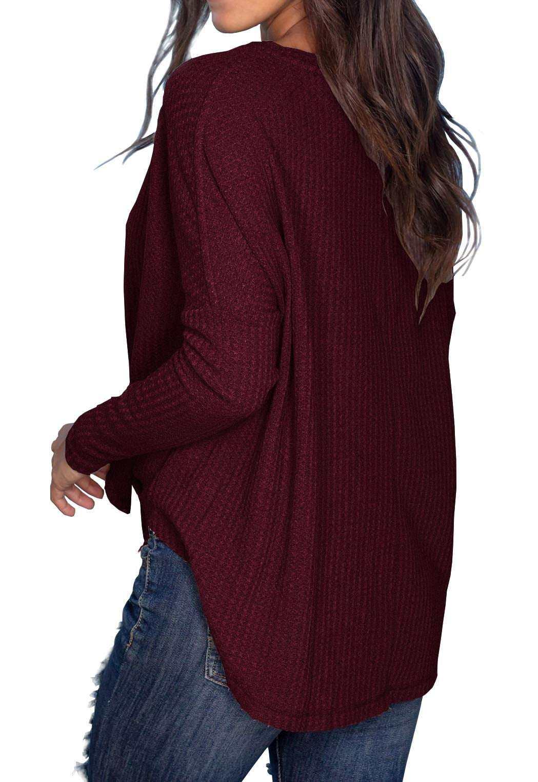 Women blouse long sleeve V-neck button down in burgundy, side view.