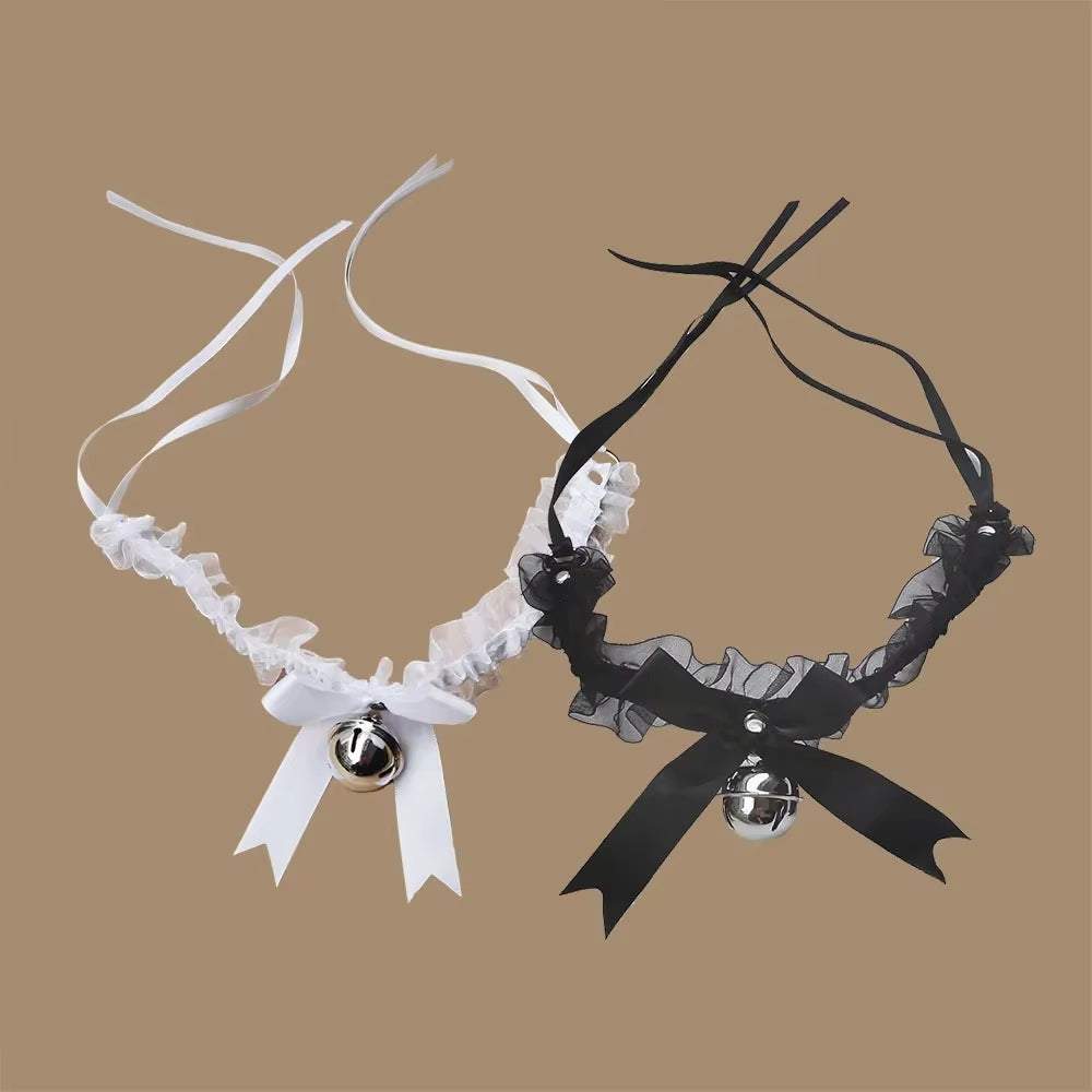 Gothic lace choker necklace with bow and bell in black and white styles.