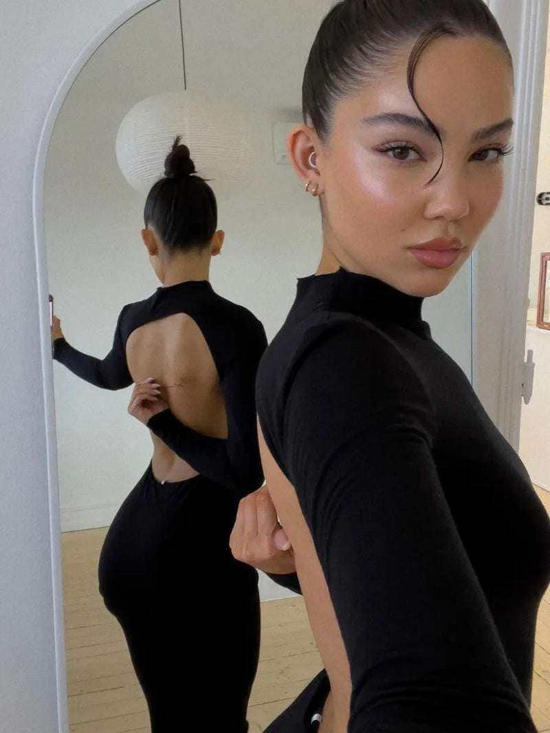 Black backless women party dress with high split and long sleeves.