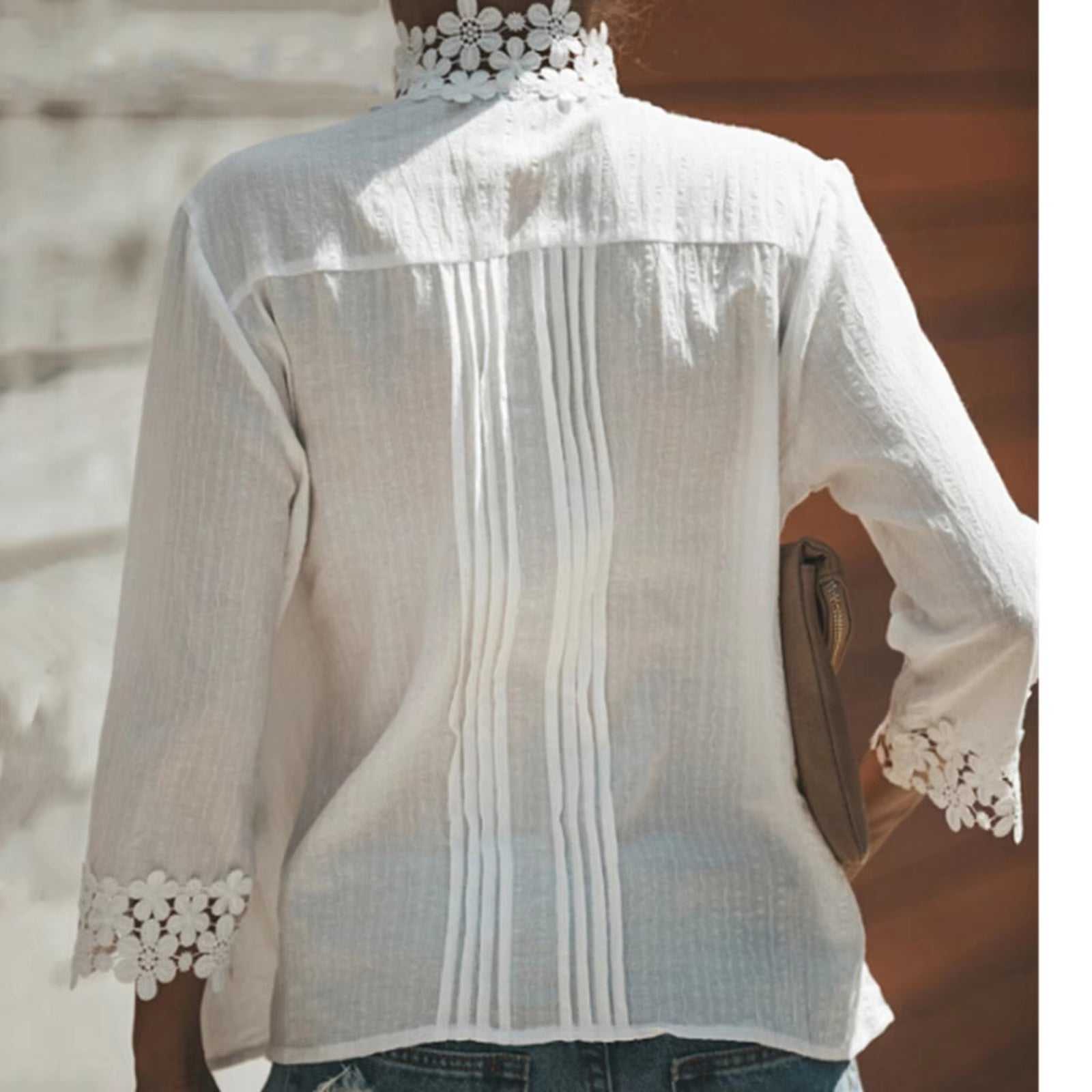 Women's fashion white casual top with lace details, featuring a chic V-neck design.
