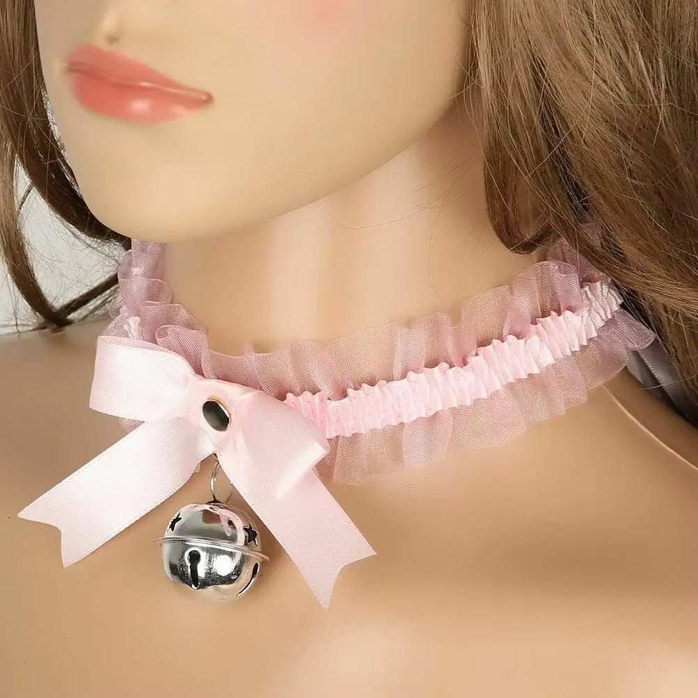 Gothic lace choker necklace with pink bow and bell pendant.