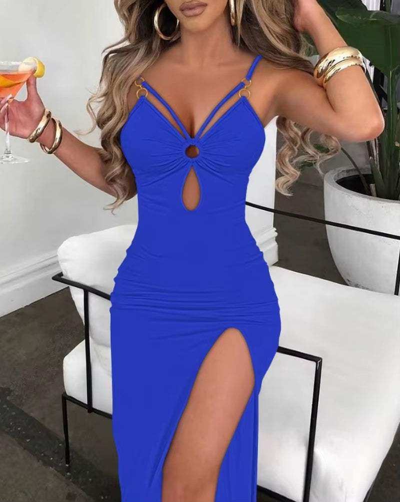 Spaghetti strap dress with high slit and hollow-out V-neck design.