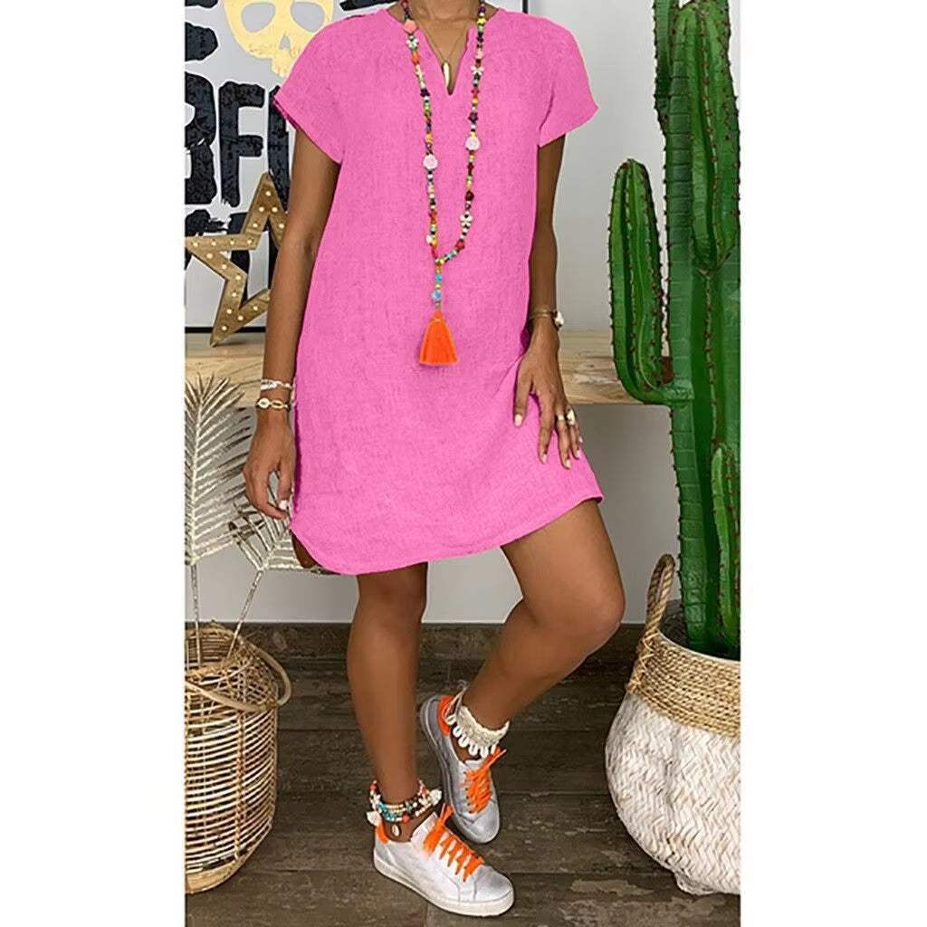 Summer loose solid color short-sleeved V-neck cotton linen dress in pink.